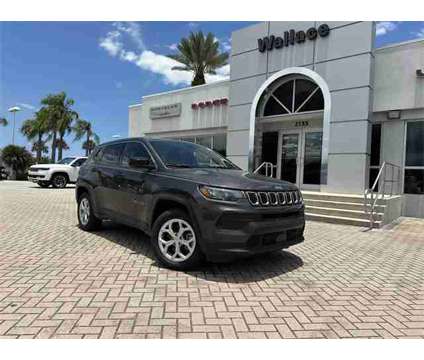 2024 Jeep Compass Sport is a Grey 2024 Jeep Compass Sport SUV in Stuart FL