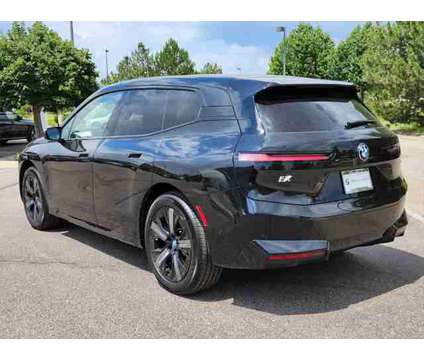 2025 BMW iX xDrive50 is a Black 2025 BMW 325 Model iX SUV in Loveland CO