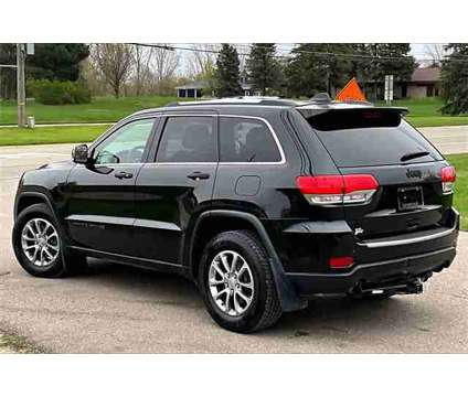 2014 Jeep Grand Cherokee Limited is a Black 2014 Jeep grand cherokee Limited SUV in Ortonville MI