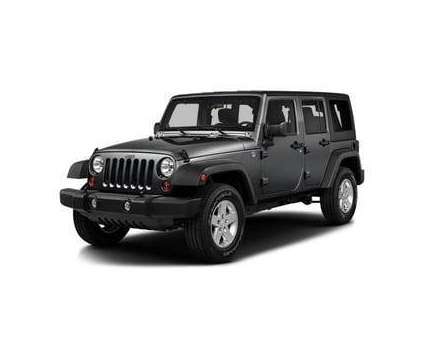 2016 Jeep Wrangler Unlimited Willys Wheeler is a Grey 2016 Jeep Wrangler Unlimited SUV in Lafayette LA