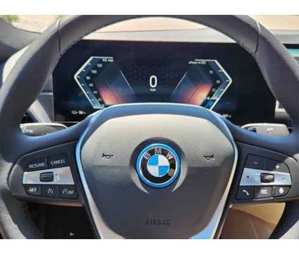 2024 BMW i4 xDrive40 is a Orange 2024 Sedan in Loveland CO