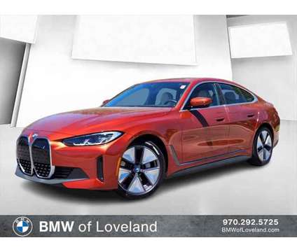 2024 BMW i4 xDrive40 is a Orange 2024 Sedan in Loveland CO