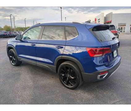 2022 Volkswagen Taos 1.5T SE is a Blue 2022 SUV in Dubuque IA