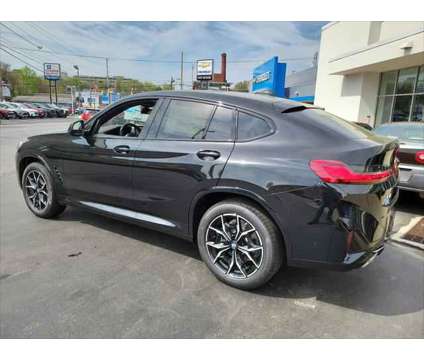 2024 BMW X4 xDrive30i is a Black 2024 BMW X4 xDrive30i SUV in Scranton PA