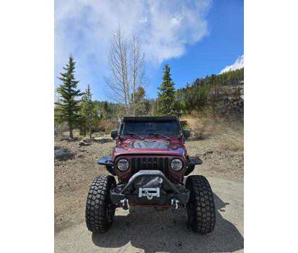 2003 Jeep Wrangler for sale is a Red 2003 Jeep Wrangler Car for Sale in Breckenridge CO