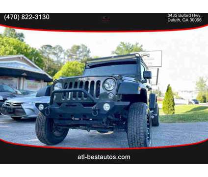 2015 Jeep Wrangler for sale is a Green 2015 Jeep Wrangler Car for Sale in Duluth GA