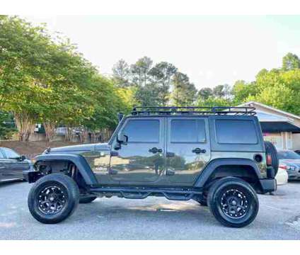 2015 Jeep Wrangler for sale is a Green 2015 Jeep Wrangler Car for Sale in Duluth GA