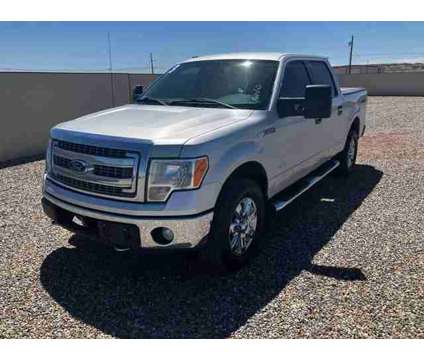 2013 Ford F150 SuperCrew Cab for sale is a Silver 2013 Ford F-150 SuperCrew Car for Sale in Farmington NM