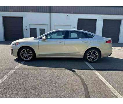 2019 Ford Fusion for sale is a Gold 2019 Ford Fusion Car for Sale in Fredericksburg VA