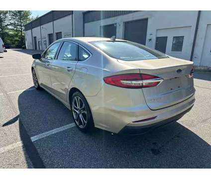2019 Ford Fusion for sale is a Gold 2019 Ford Fusion Car for Sale in Fredericksburg VA