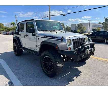 2010 Jeep Wrangler for sale is a Silver 2010 Jeep Wrangler Car for Sale in Miami FL