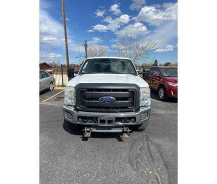 2015 Ford F250 Super Duty Crew Cab for sale is a White 2015 Ford F-250 Super Duty Car for Sale in Lakewood CO