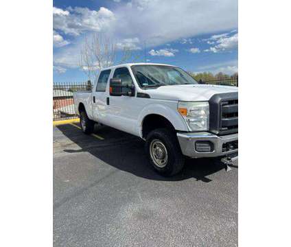 2015 Ford F250 Super Duty Crew Cab for sale is a White 2015 Ford F-250 Super Duty Car for Sale in Lakewood CO