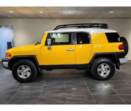 2009 Toyota FJ Cruiser for sale is a Yellow 2009 Toyota FJ Cruiser Car for Sale in Rolling Meadows IL
