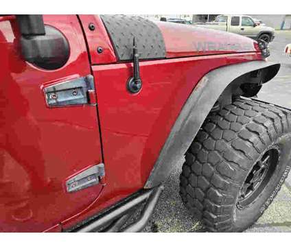 2012UsedJeepUsedWrangler UnlimitedUsed4WD 4dr is a Red 2012 Jeep Wrangler Unlimited Car for Sale in Watseka IL