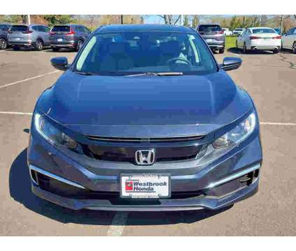 2021UsedHondaUsedCivicUsedCVT is a Blue 2021 Honda Civic Car for Sale in Westbrook CT