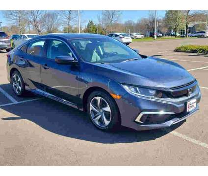 2021UsedHondaUsedCivicUsedCVT is a Blue 2021 Honda Civic Car for Sale in Westbrook CT