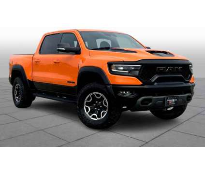 2022UsedRamUsed1500Used4x4 Crew Cab 5 7 Box is a Orange 2022 RAM 1500 Model Car for Sale in Houston TX