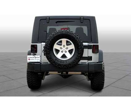 2015UsedJeepUsedWranglerUsed4WD 2dr is a Silver 2015 Jeep Wrangler Car for Sale in Richmond TX
