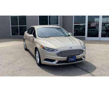 2018 Ford Fusion SE is a Gold 2018 Ford Fusion SE Car for Sale in Appleton WI