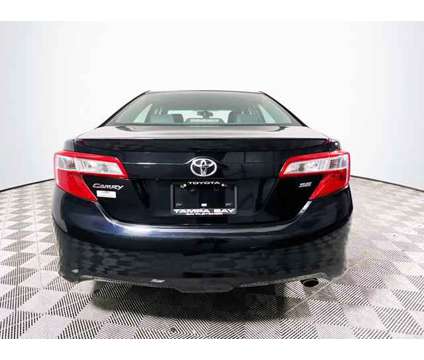 2014 Toyota Camry SE is a Silver 2014 Toyota Camry SE Car for Sale in Tampa FL