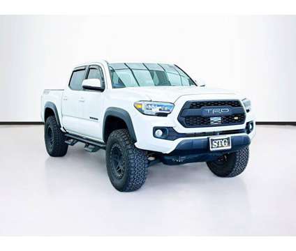 2022 Toyota Tacoma 4WD TRD Off-Road V6 is a White 2022 Toyota Tacoma TRD Off Road Truck in Bellflower CA