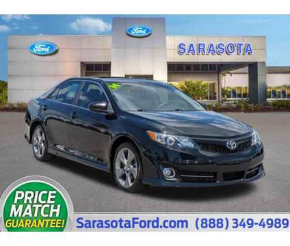 2014 Toyota Camry SE is a Black 2014 Toyota Camry SE Car for Sale in Sarasota FL