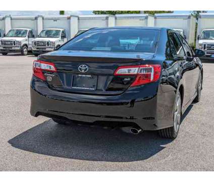 2014 Toyota Camry SE is a Black 2014 Toyota Camry SE Car for Sale in Sarasota FL