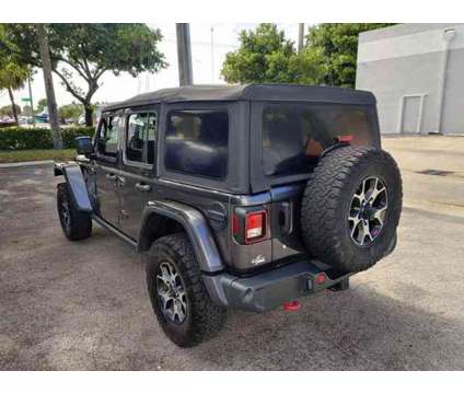 2018 Jeep Wrangler Unlimited for sale is a Grey 2018 Jeep Wrangler Unlimited Car for Sale in Hallandale Beach FL