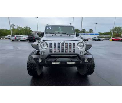 2016 Jeep Wrangler Unlimited Sahara is a Silver 2016 Jeep Wrangler Unlimited Sahara SUV in Newport News VA