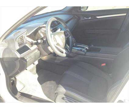 2020 Honda Civic Sport Sedan is a Silver, White 2020 Honda Civic Sport Sedan in Las Cruces NM
