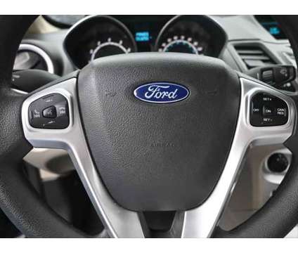 2017 Ford Fiesta SE is a Black 2017 Ford Fiesta SE Hatchback in Dubuque IA