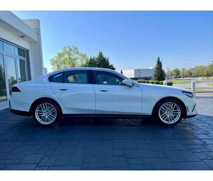 2024 BMW 5 Series i xDrive is a White 2024 BMW 5-Series Sedan in Mechanicsburg PA