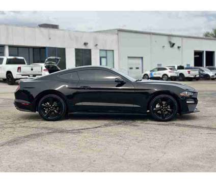 2023 Ford Mustang EcoBoost is a Black 2023 Ford Mustang EcoBoost Coupe in Manteno IL