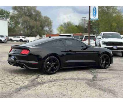 2023 Ford Mustang EcoBoost is a Black 2023 Ford Mustang EcoBoost Coupe in Manteno IL