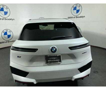 2025 BMW iX xDrive50 is a White 2025 BMW 325 Model iX SUV in Brooklyn NY