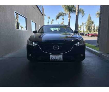 2016 Mazda MAZDA6 i Touring is a Blue 2016 Mazda MAZDA 6 i Sedan in Bakersfield CA