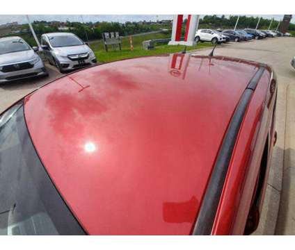 2009 Pontiac Vibe Base is a Red 2009 Pontiac Vibe Base Car for Sale in Triadelphia WV