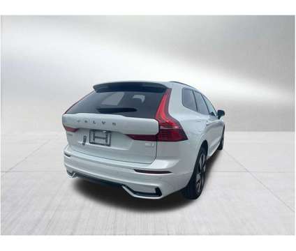 2024 Volvo XC60 Recharge Plug-In Hybrid T8 Plus Dark Theme is a White 2024 Volvo XC60 3.2 Trim Hybrid in Miami FL