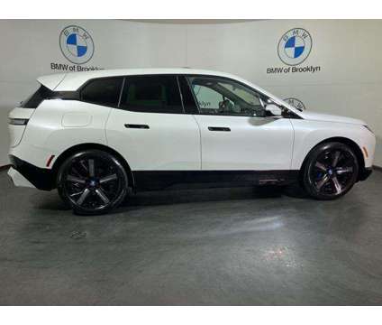 2025 BMW iX xDrive50 is a White 2025 BMW 325 Model iX SUV in Brooklyn NY