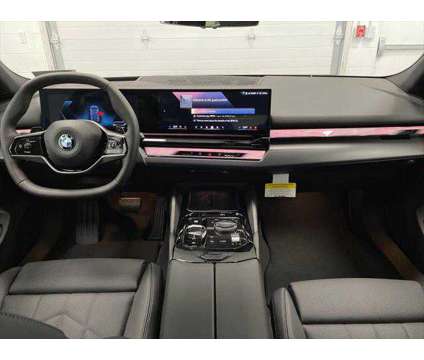 2024 BMW 5 Series i xDrive is a Blue 2024 BMW 5-Series Sedan in Erie PA