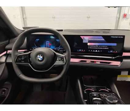 2024 BMW 5 Series i xDrive is a Blue 2024 BMW 5-Series Sedan in Erie PA