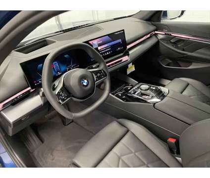 2024 BMW 5 Series i xDrive is a Blue 2024 BMW 5-Series Sedan in Erie PA