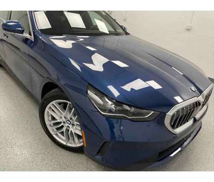 2024 BMW 5 Series i xDrive is a Blue 2024 BMW 5-Series Sedan in Erie PA