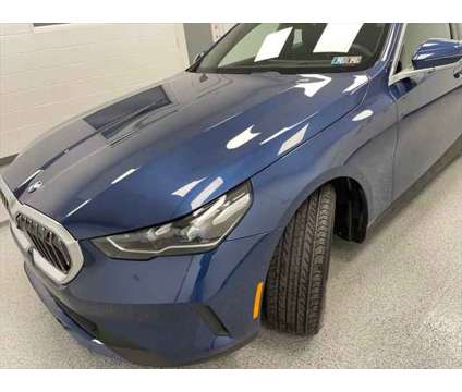 2024 BMW 5 Series i xDrive is a Blue 2024 BMW 5-Series Sedan in Erie PA