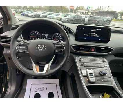 2023 Hyundai Santa Fe SEL is a Black 2023 Hyundai Santa Fe SE SUV in Lakewood NY