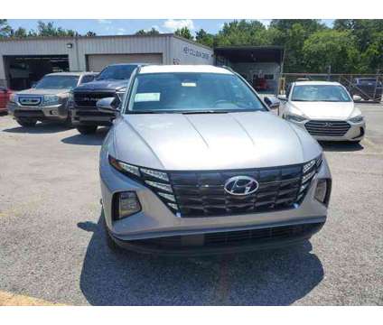 2023 Hyundai Tucson SEL is a Silver 2023 Hyundai Tucson SUV in Jacksonville FL