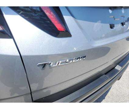 2023 Hyundai Tucson SEL is a Silver 2023 Hyundai Tucson SUV in Jacksonville FL