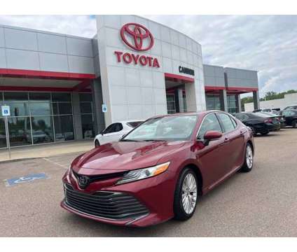 2019 Toyota Camry XLE is a Red 2019 Toyota Camry XLE Sedan in Vicksburg MS