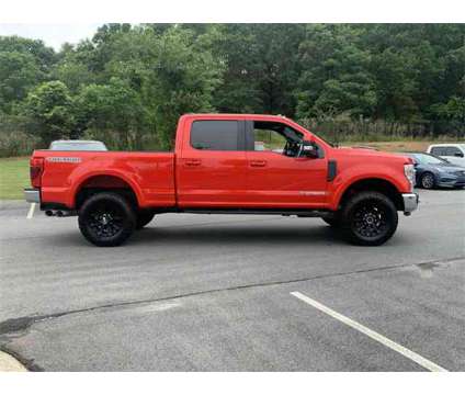 2022 Ford F-250SD Lariat is a Red 2022 Ford F-250 Lariat Truck in Bogart GA